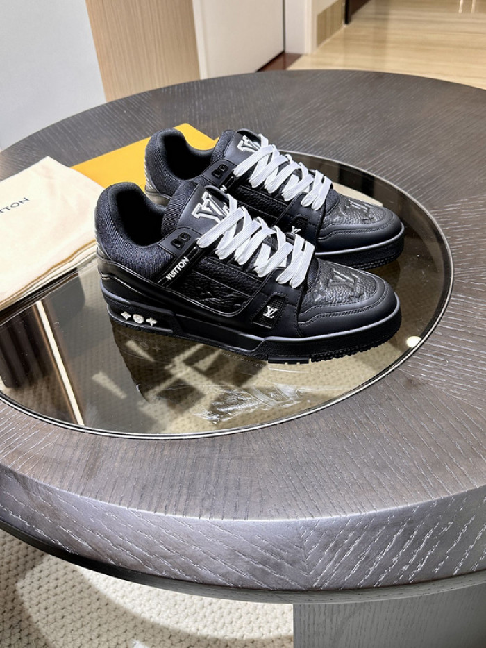 l**is V*t*n trainer black embossed monogram