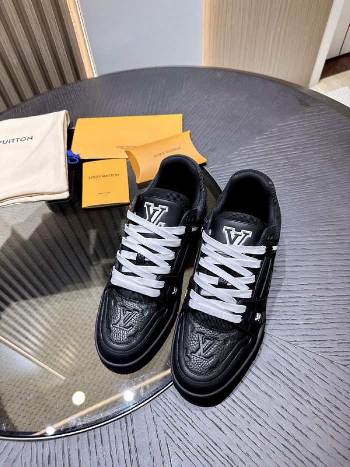 l**is V*t*n trainer black embossed monogram