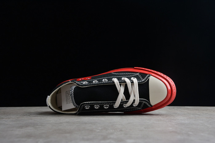 comme des garçons play x chuck 70 low